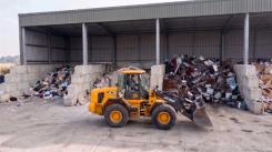 JCB at a waste transfer station