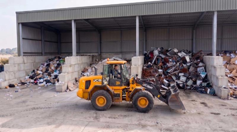 JCB at a waste transfer station
