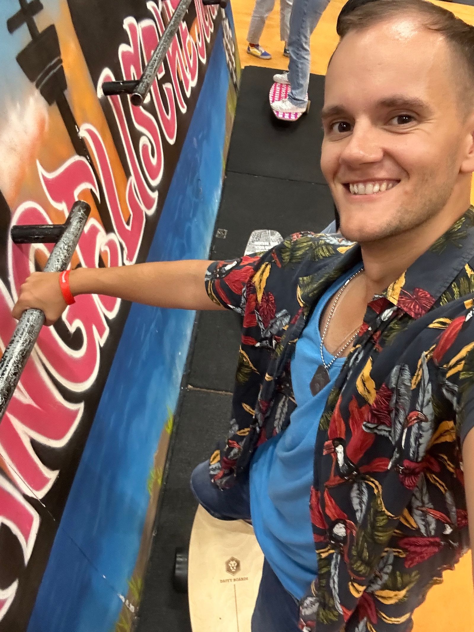 The surfboard-on-a-rolling-pin thing, mid-balance.