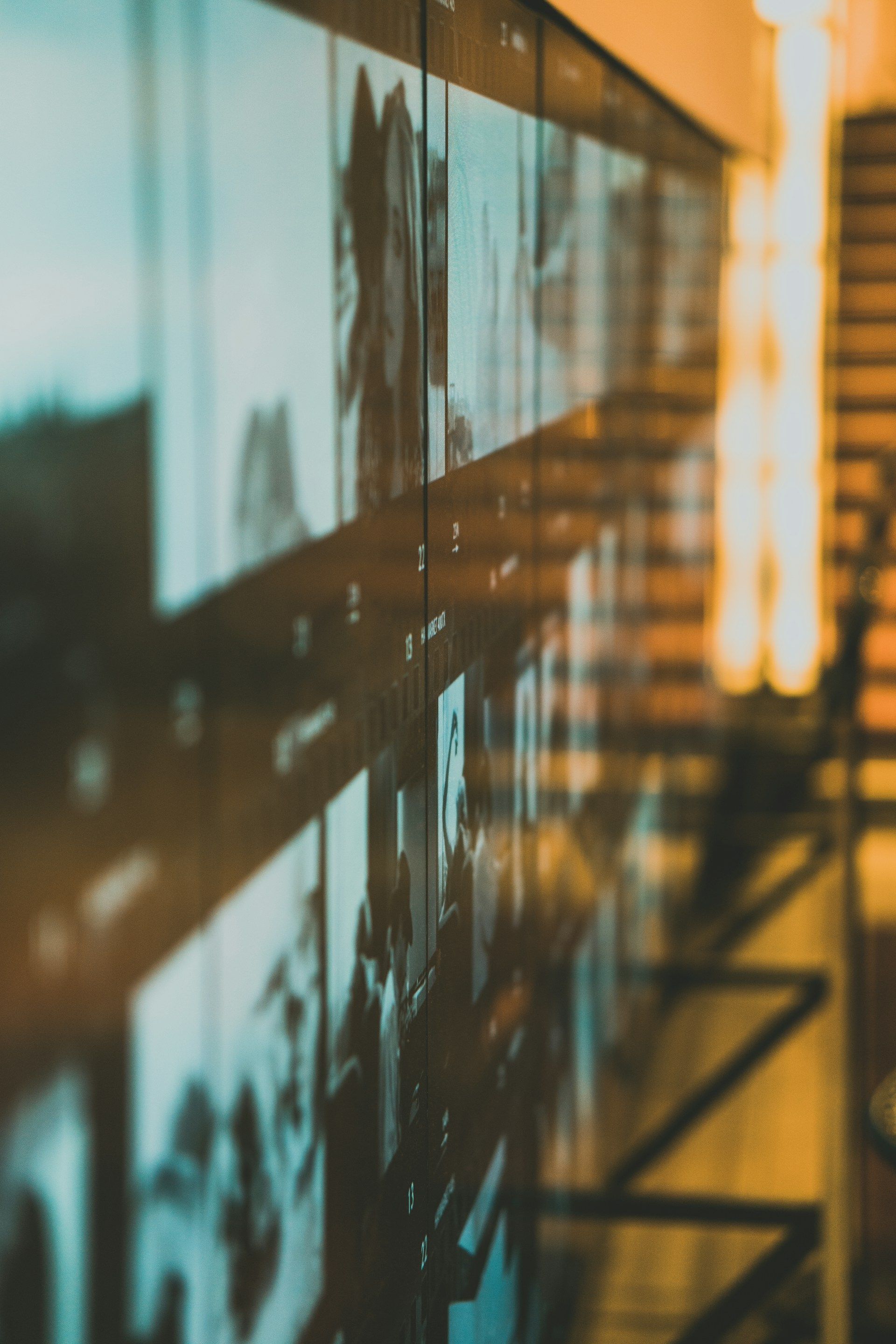 wall filled with screens in an office