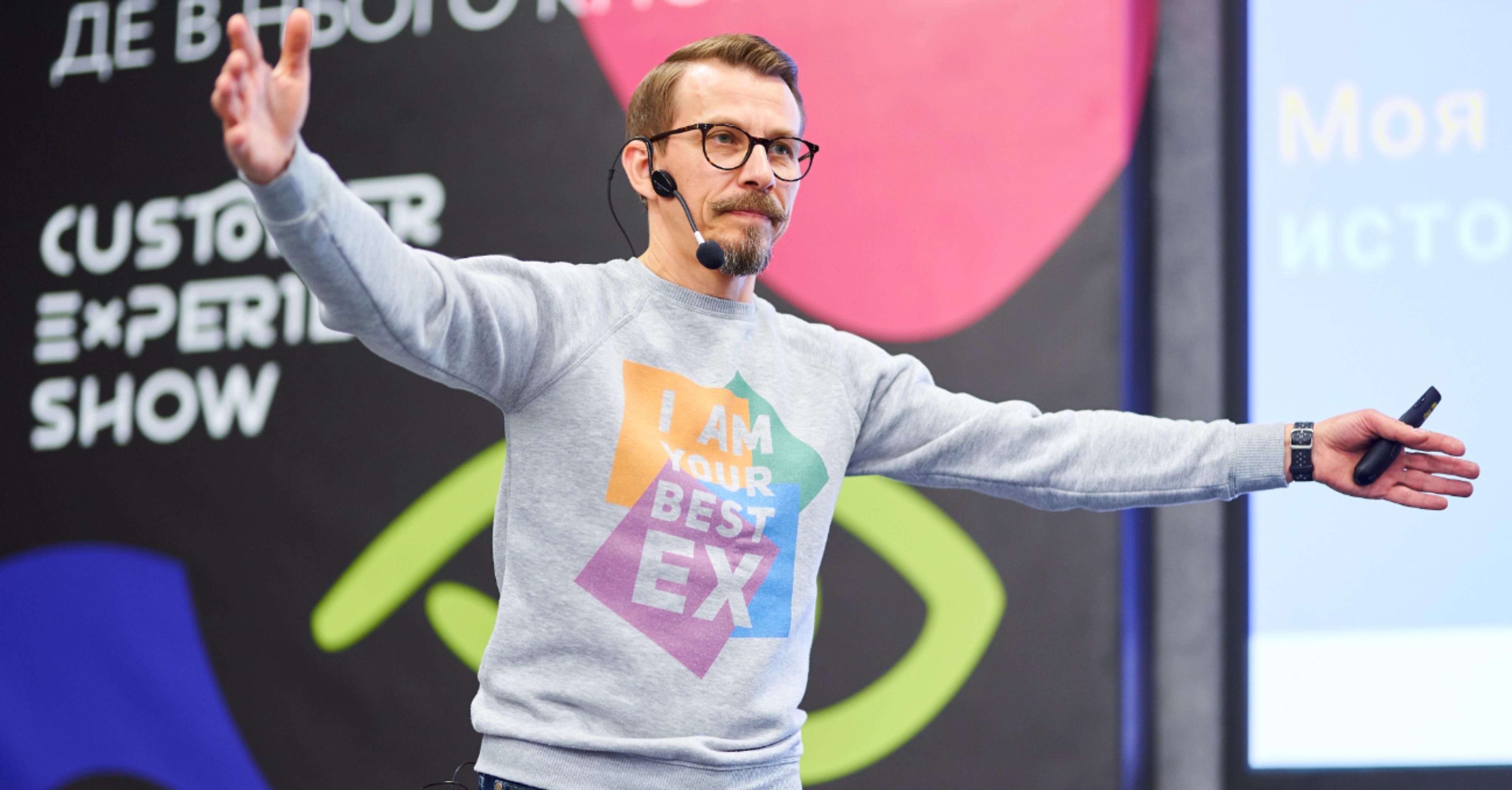 Dennis Brodsky speaking on stage