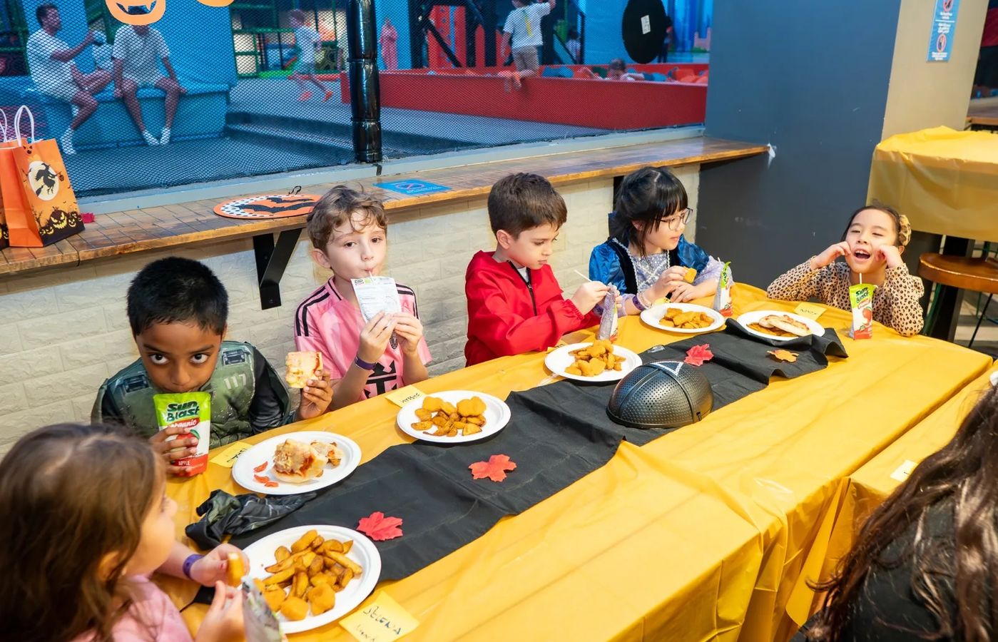 Kids at the Halloween Party table