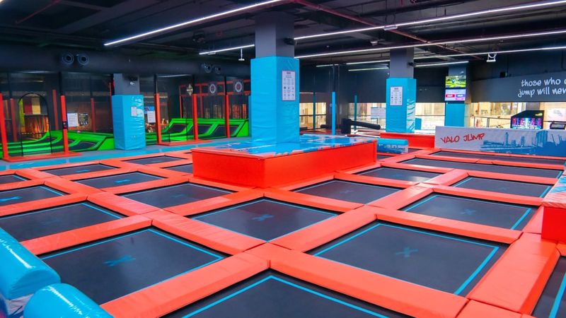 Indoor trampoline area at Trampo UAE