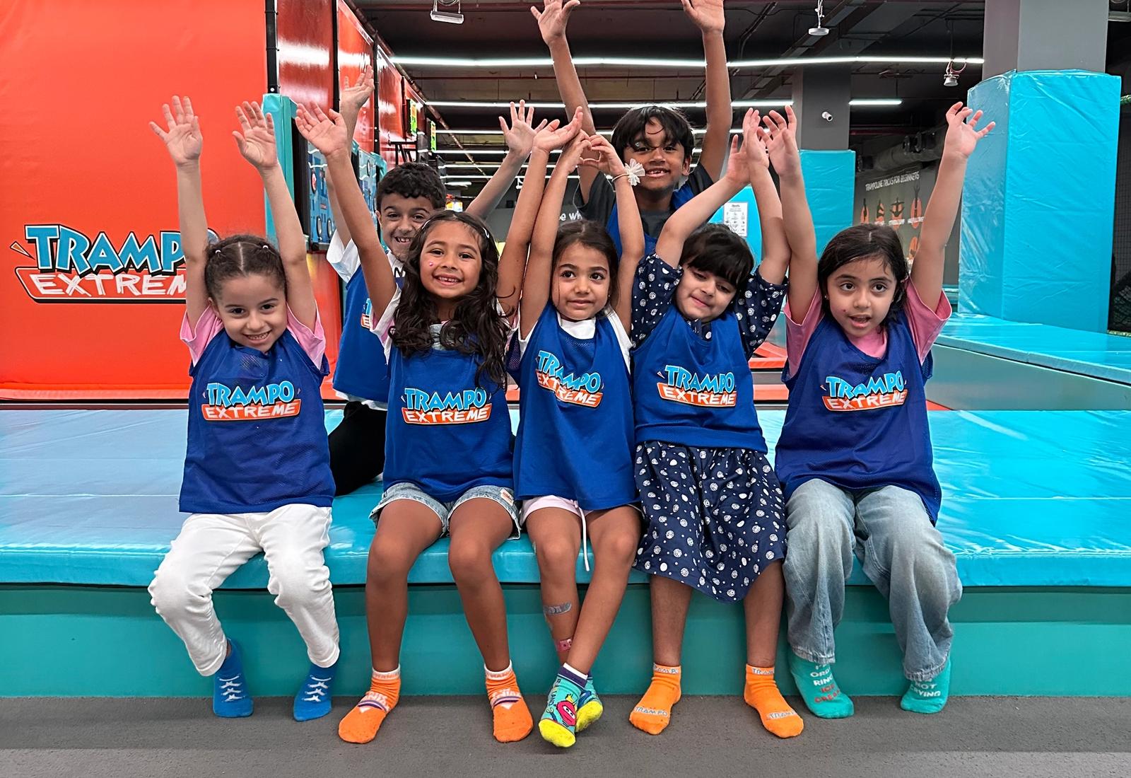 Students enjoying a fun jump session at Trampo during the school class offer