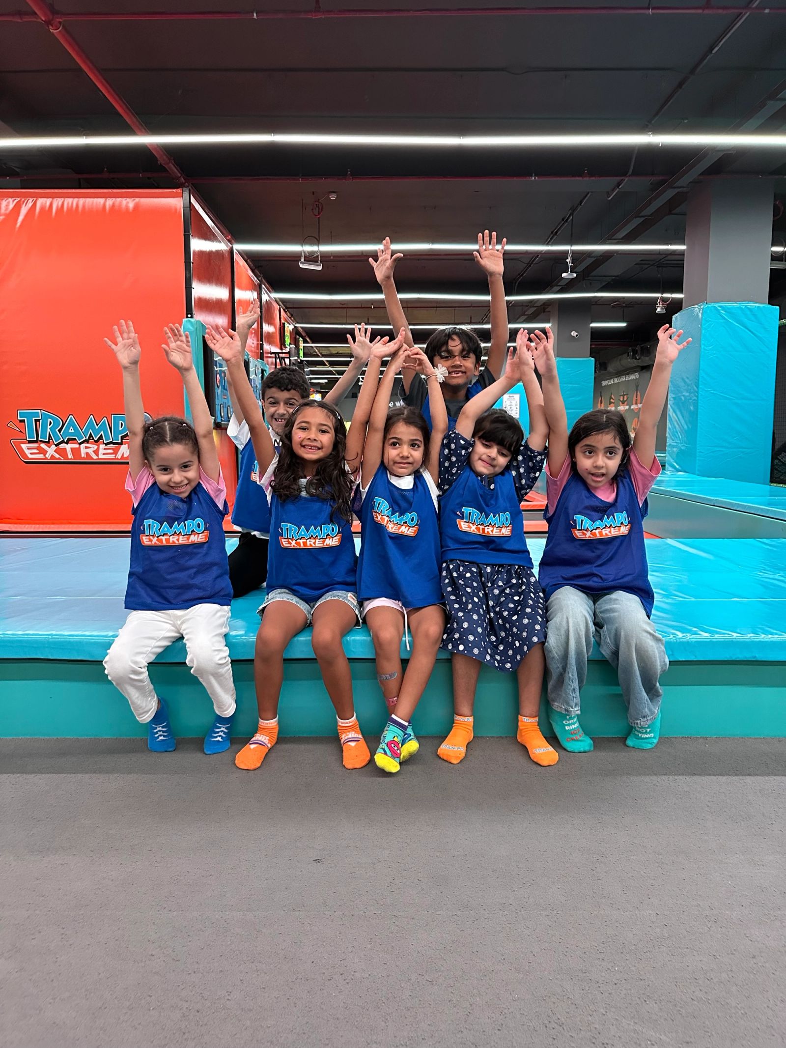 Students enjoying a fun jump session at Trampo during the school class offer