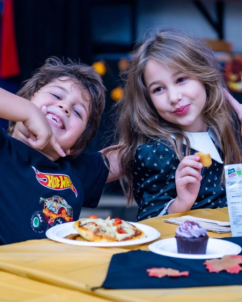 Two kids at the Halloween Party