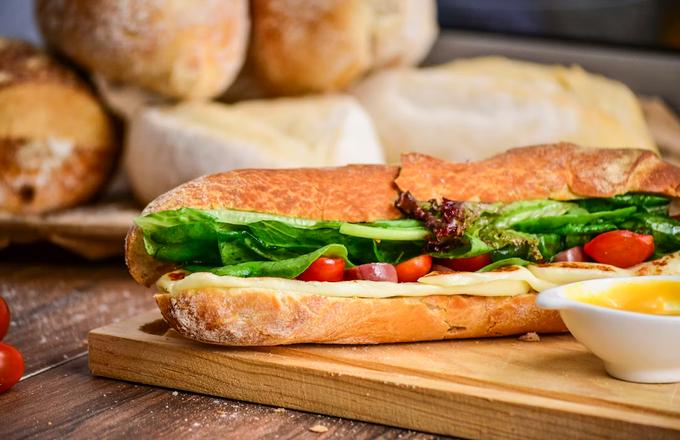 green chili philly sandwich from road34 on a cutting board