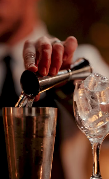 Bartender mixing drinks