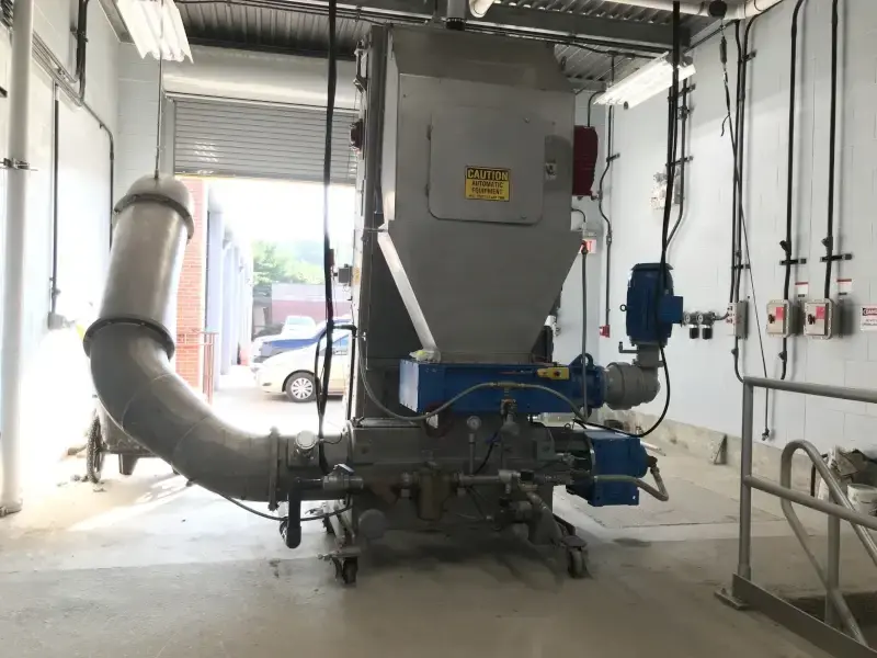 SPIRALIFT SC screenings washer and compactor installed downstream of a wastewater screen