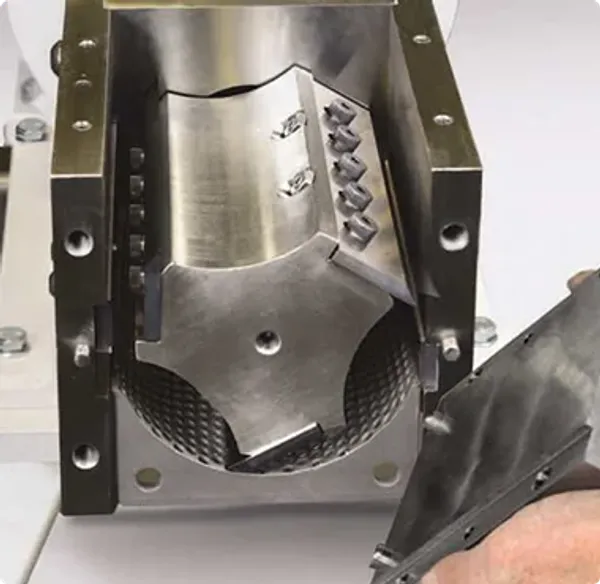 A closeup of an industrial knife mill used for grinding cannabis