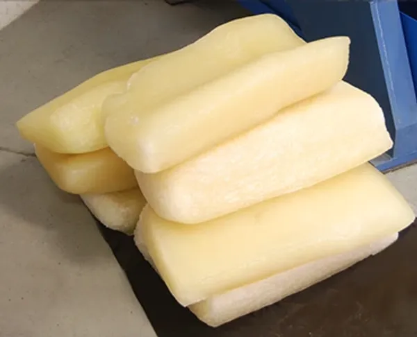 A pile of rubber bales on the ground