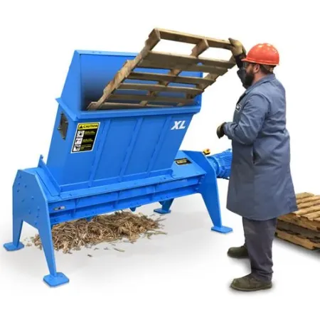 man operating pallet shredder