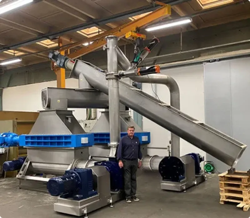 Taskmaster Electronic Waste Shredder Being Fed By Screw Conveyor