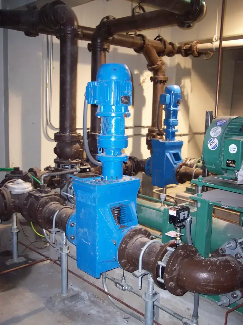 TASKMASTER inline grinder installed between flanges in a wastewater pipeline