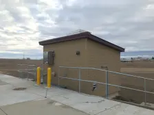 building outside with clouds