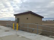 building outside with clouds