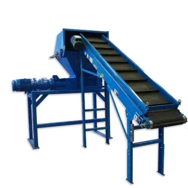 An industrial shredder with a conveyor attachment