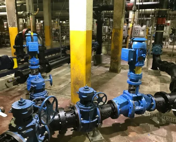 Two shredders installed inline to shred sludge