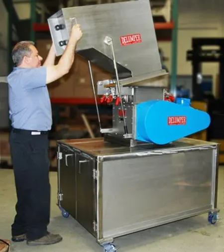 man operating crusher machine