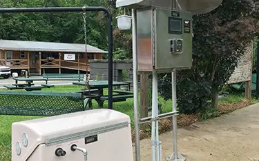 water fill station outside with tree