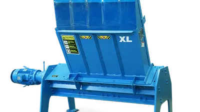 TASKMASTER® XL pallet shredder complete with stand, hopper, and controls