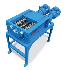 TASKMASTER QS2400 quad-shaft shredder on a stand without a hopper, its open cutting chamber showing four cutter shafts
