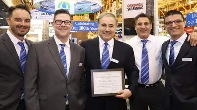 group of men with certificate