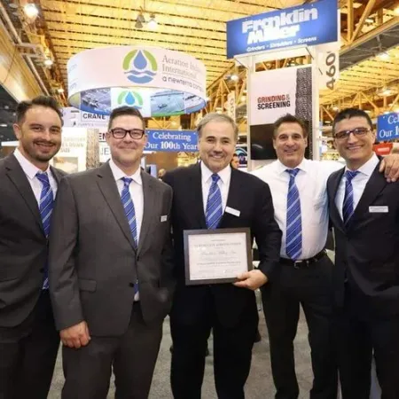 group of men with certificate