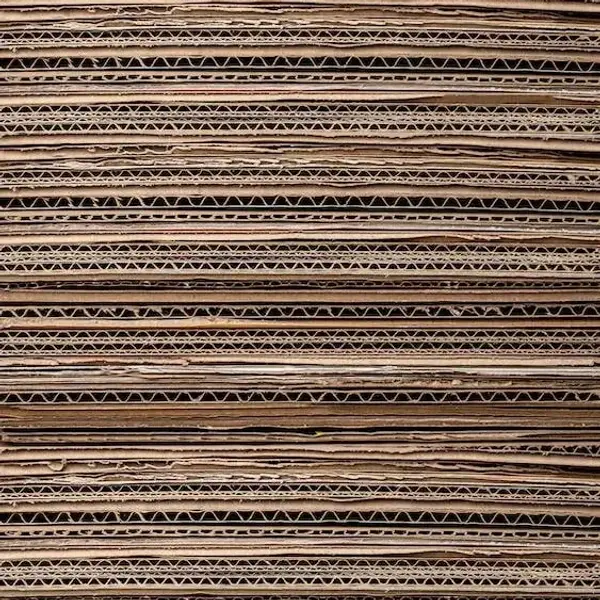 A stack of flattened cardboard pieces