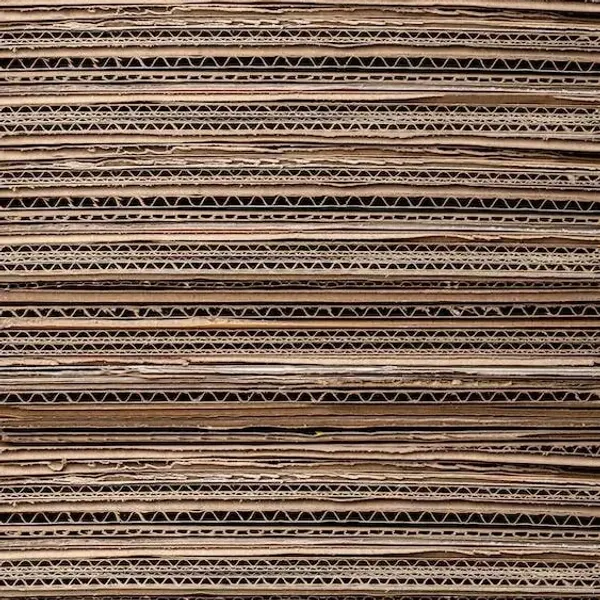 A stack of flattened cardboard pieces