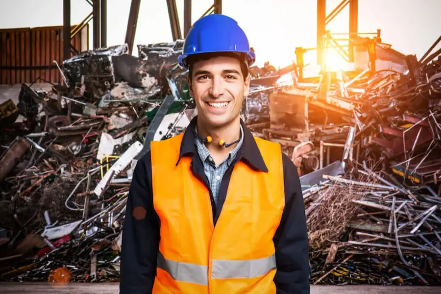 man in orange vest and hardhat