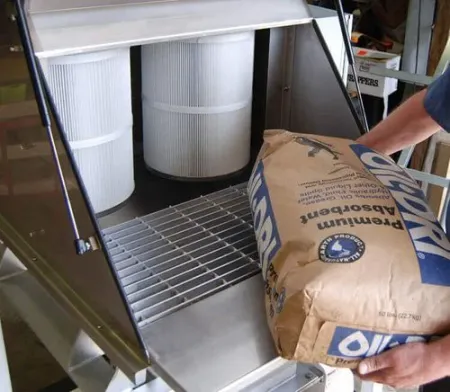 man holding bag delumper station