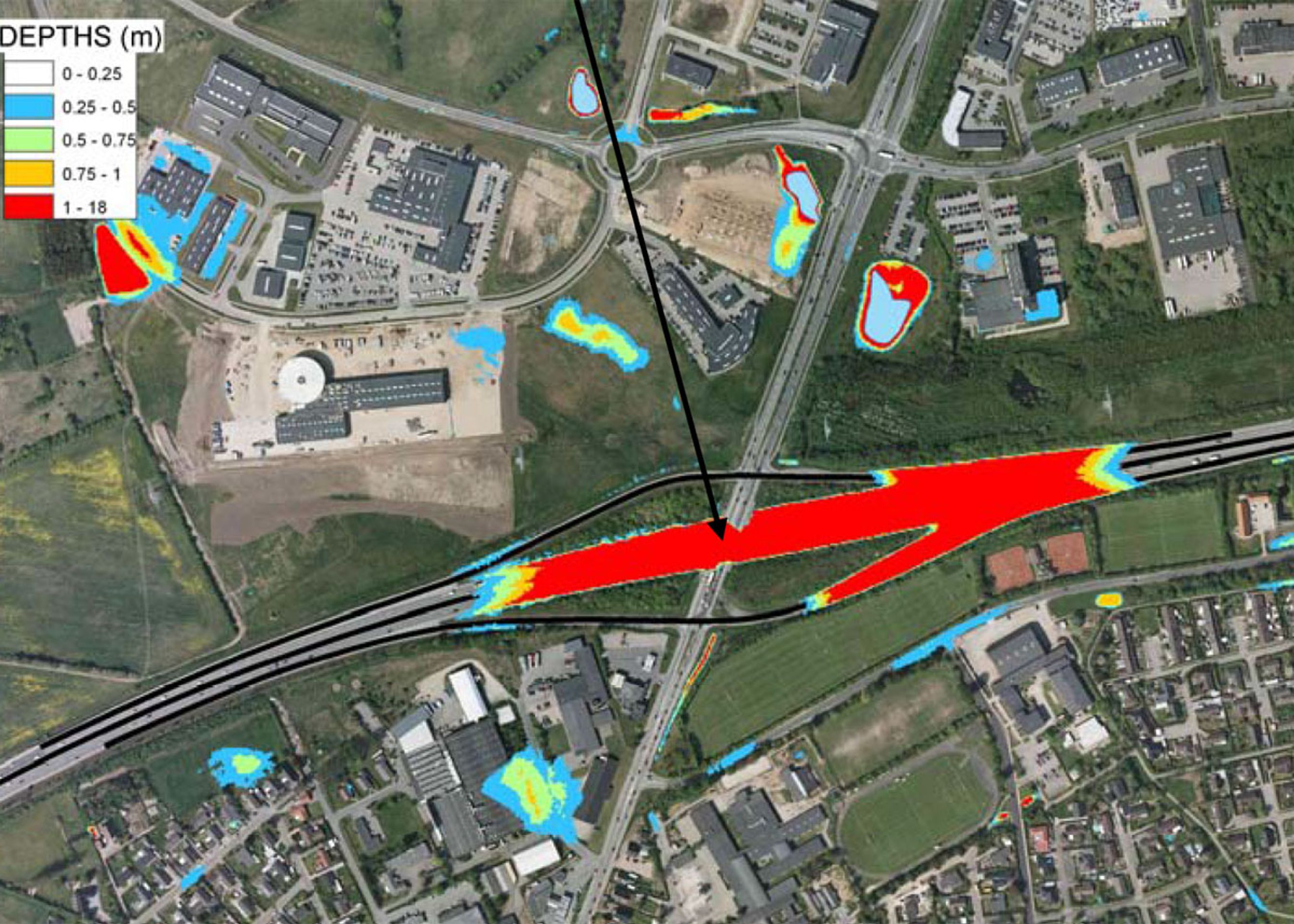 Her er der zoomet ind på en motorvej ved Kolding, der går i en lavning under en landevej.