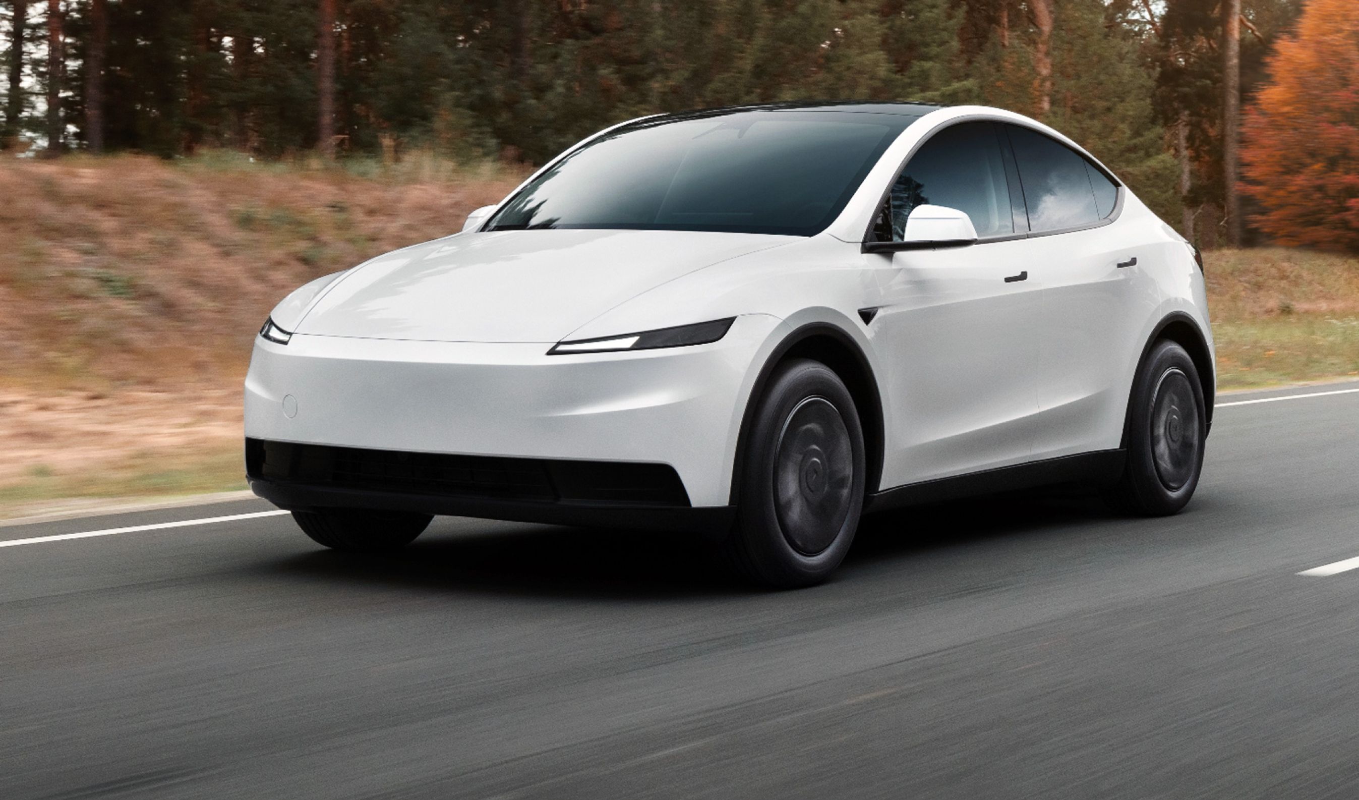 Hvid Tesla Model Y forfra.