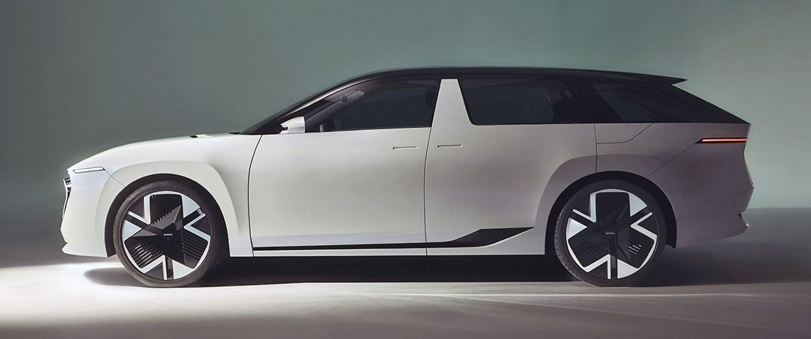 Hvid Skoda vision 0 i profil.