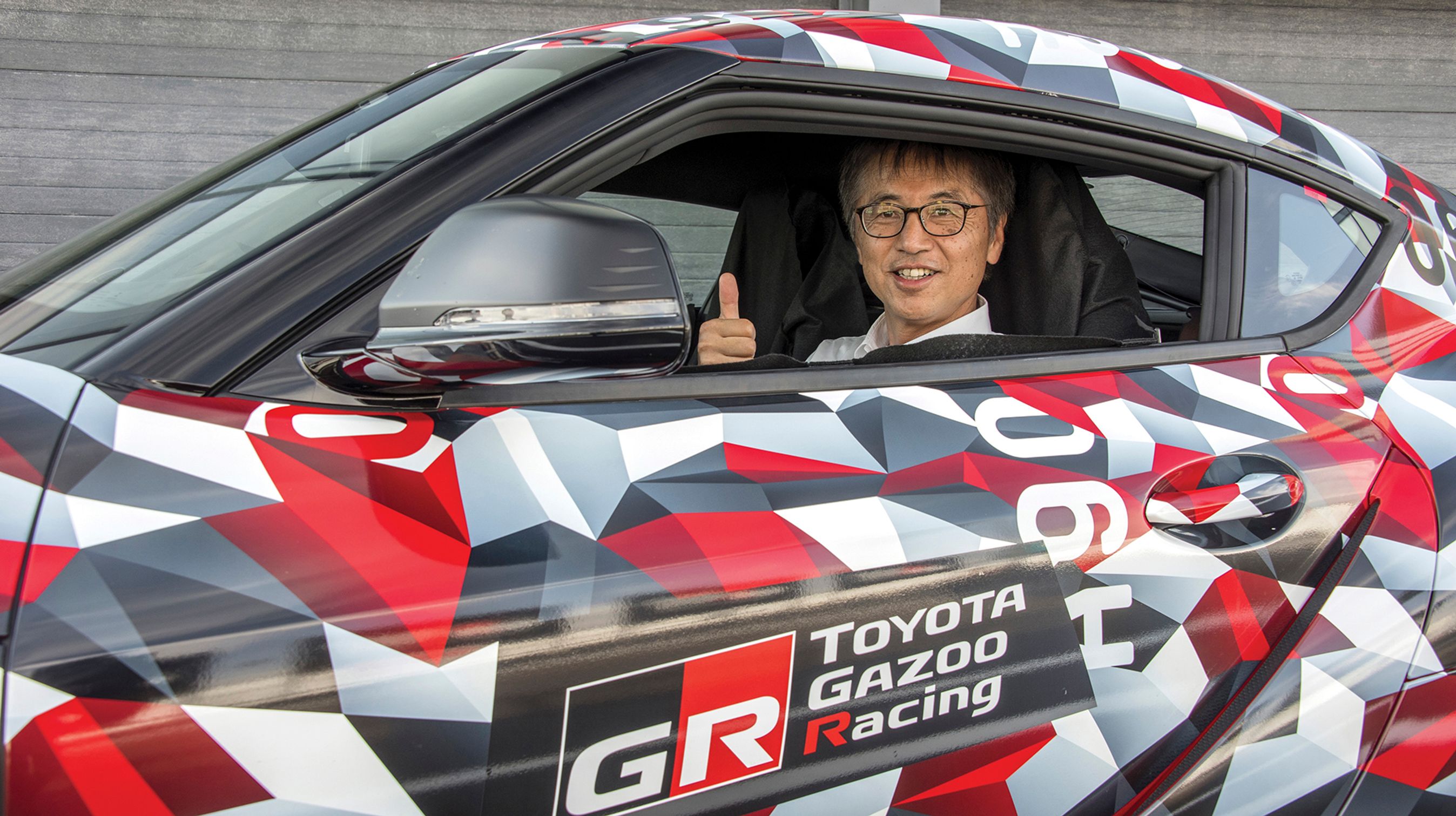 Mr. Tada er chefingeniør og faderen til Toyota Supra, idet han var den mand, der skabte forbindelsen mellem Toyota og BMW. Mr. Tada var også ansvarlig for den lidt mindre sportsvogn, GT86.