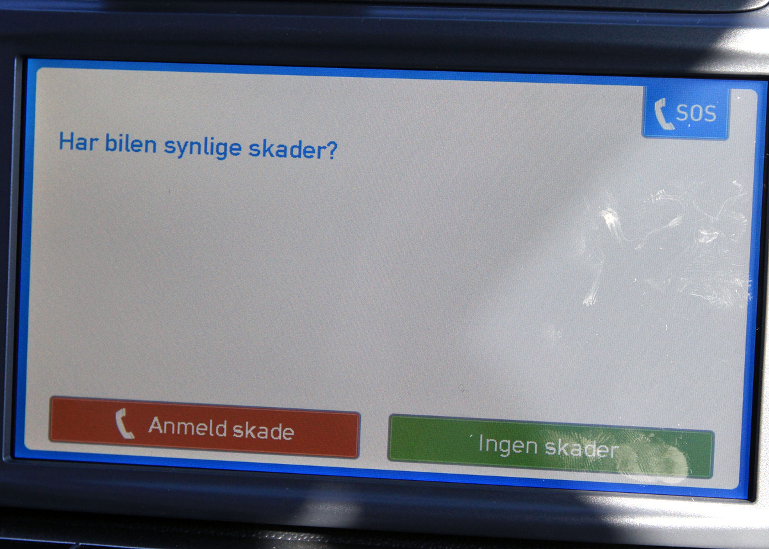 Ved start og afslutning af hver tur, skal man svare på, om bilen er skadet.