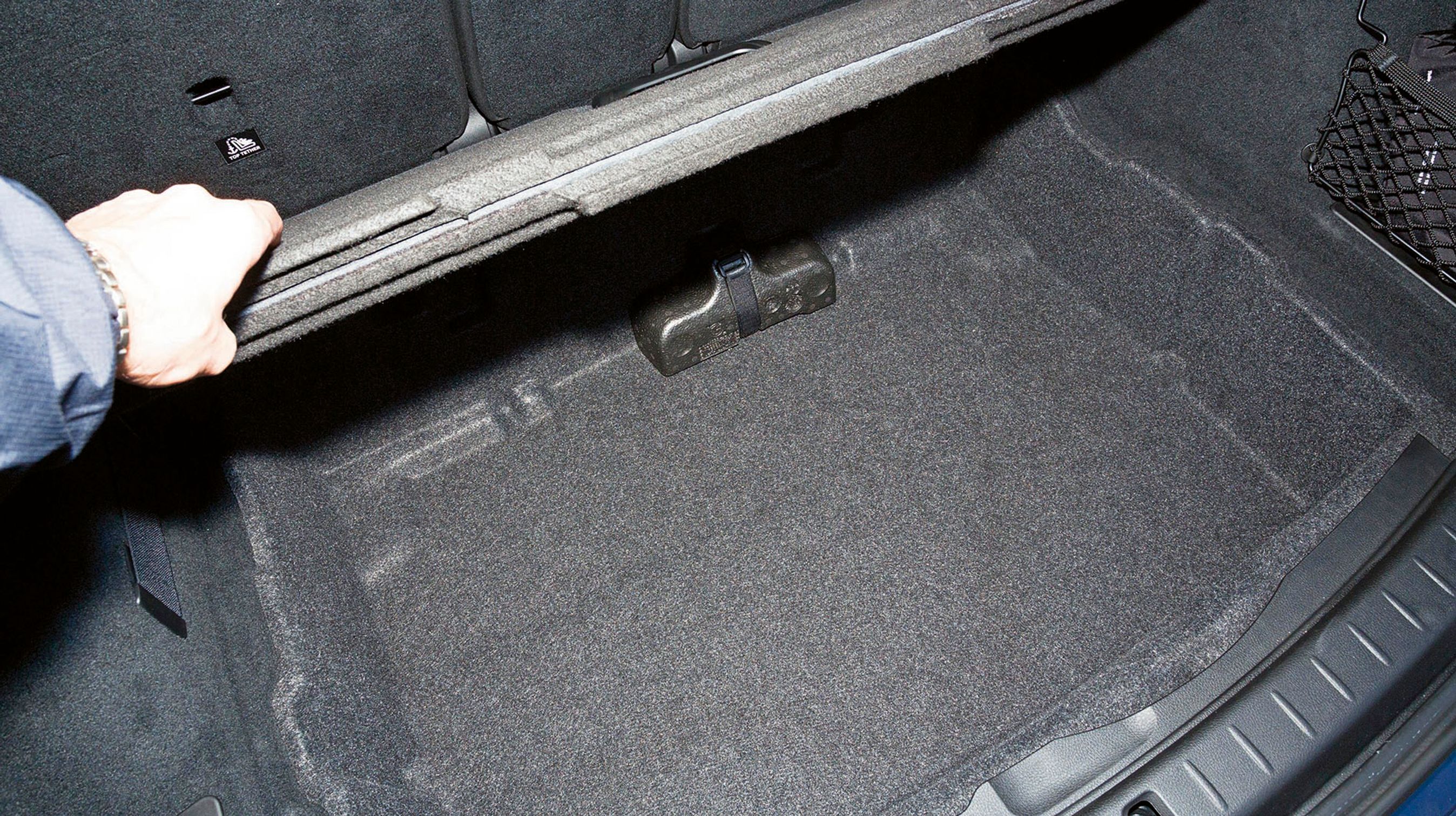 Rummet under bagagerummet gemmer ikke på et reservehjul. BMW kører med runflat-dæk, så du kan køre videre på flade dæk.