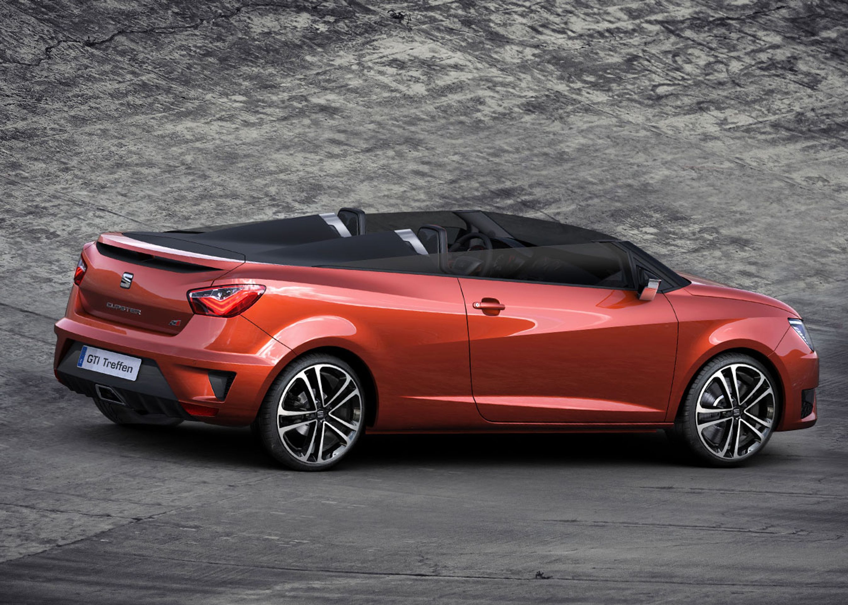 "New Orange" kaldes den særlige farve til konceptbilen, der har en mørkegrå afdækning bag sæderne.