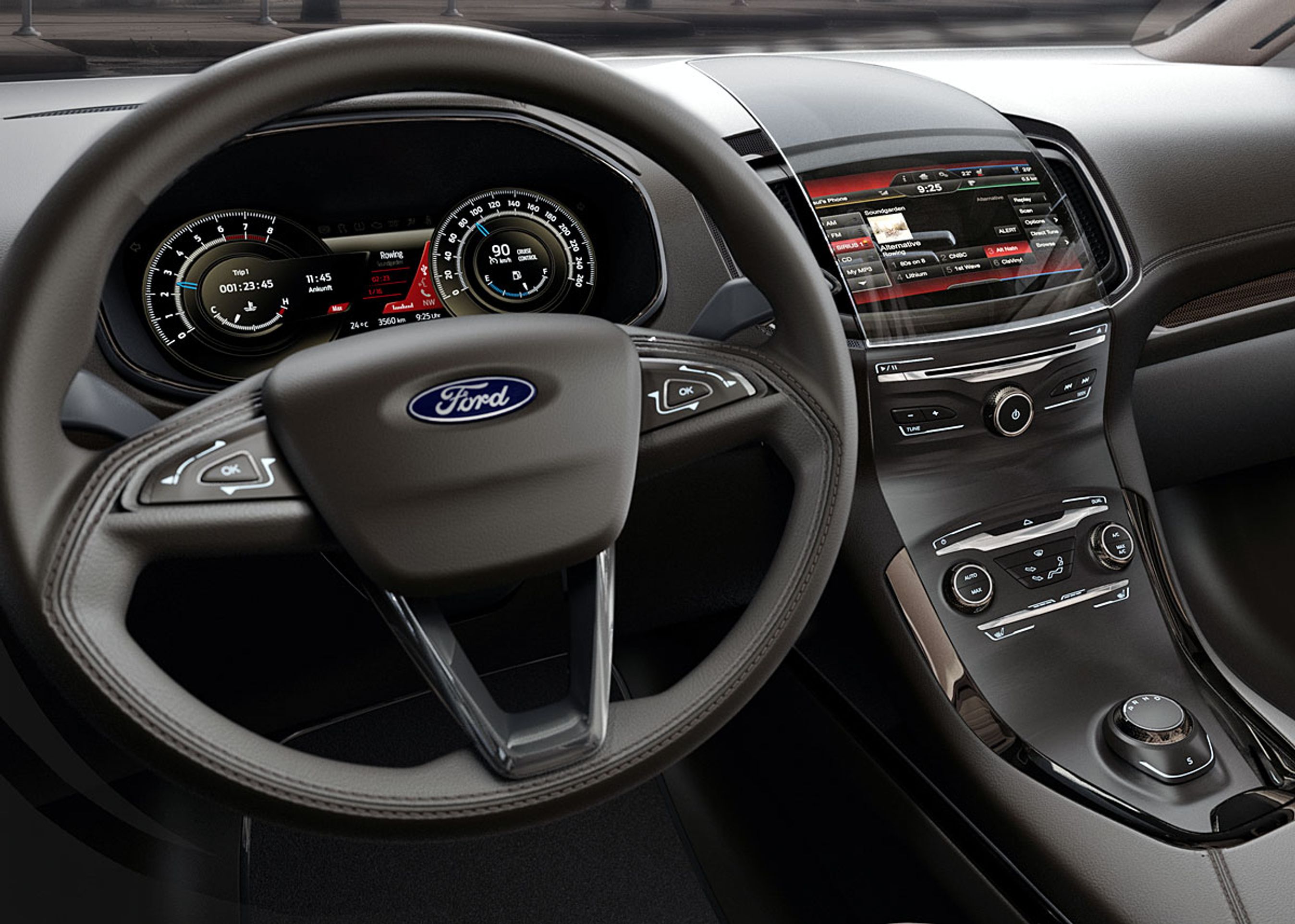 Førerpladsen i S-Max har færre knapper end den nye Mondeo. Den store skærm overtager en del af kontakten med bilen.