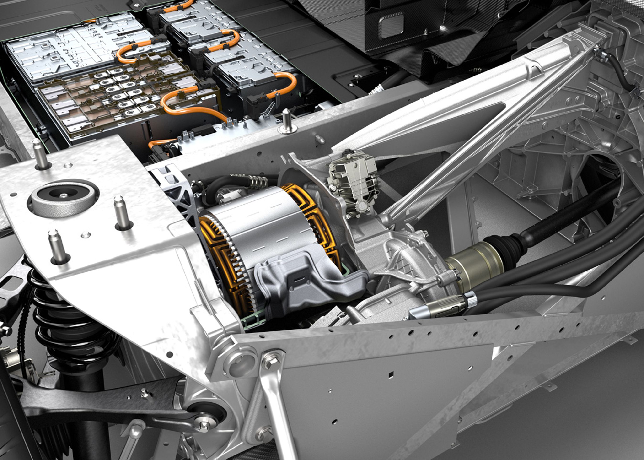 Elmotoren ligger under bagagerummet og trækker på bagakslen. Der er også plads til den lille benzinmotor ovenpå.