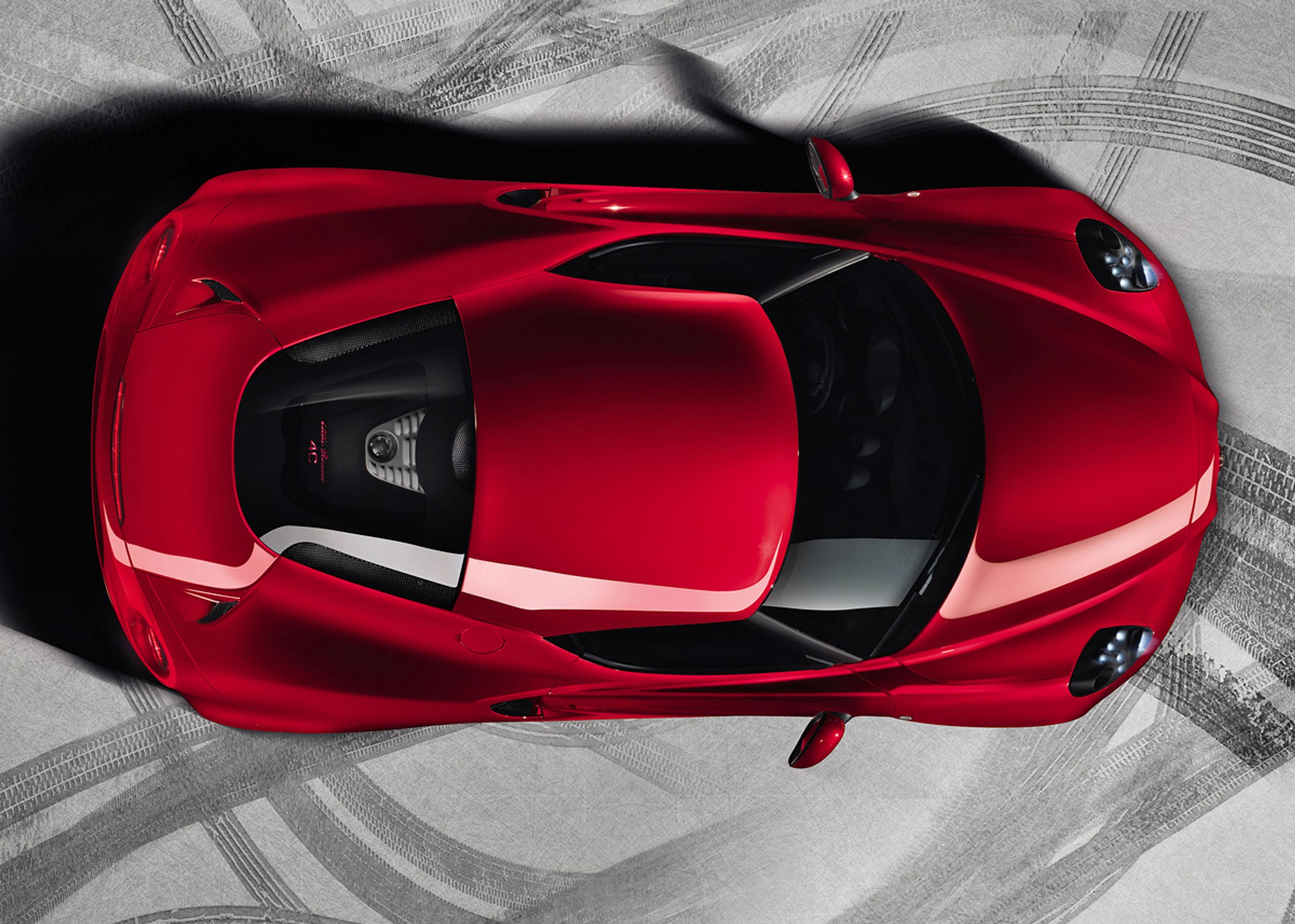 Alfa Romeo 4C er en anelse kortere end Fiat Punto og har også kortere akselafstand. Men 4C er voldsom bred; ca. to meter.