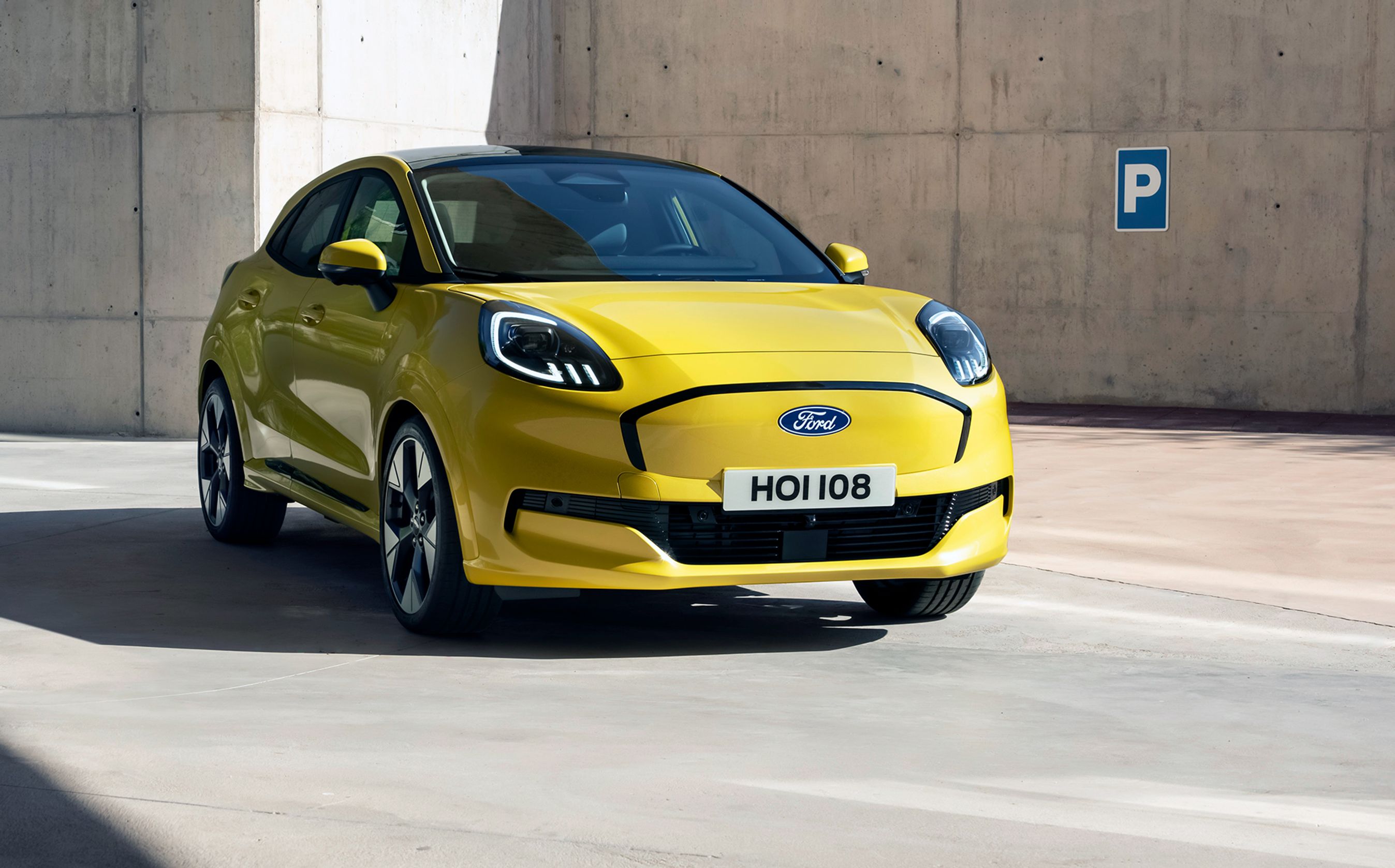 Gul Ford Puma elbil forfra.