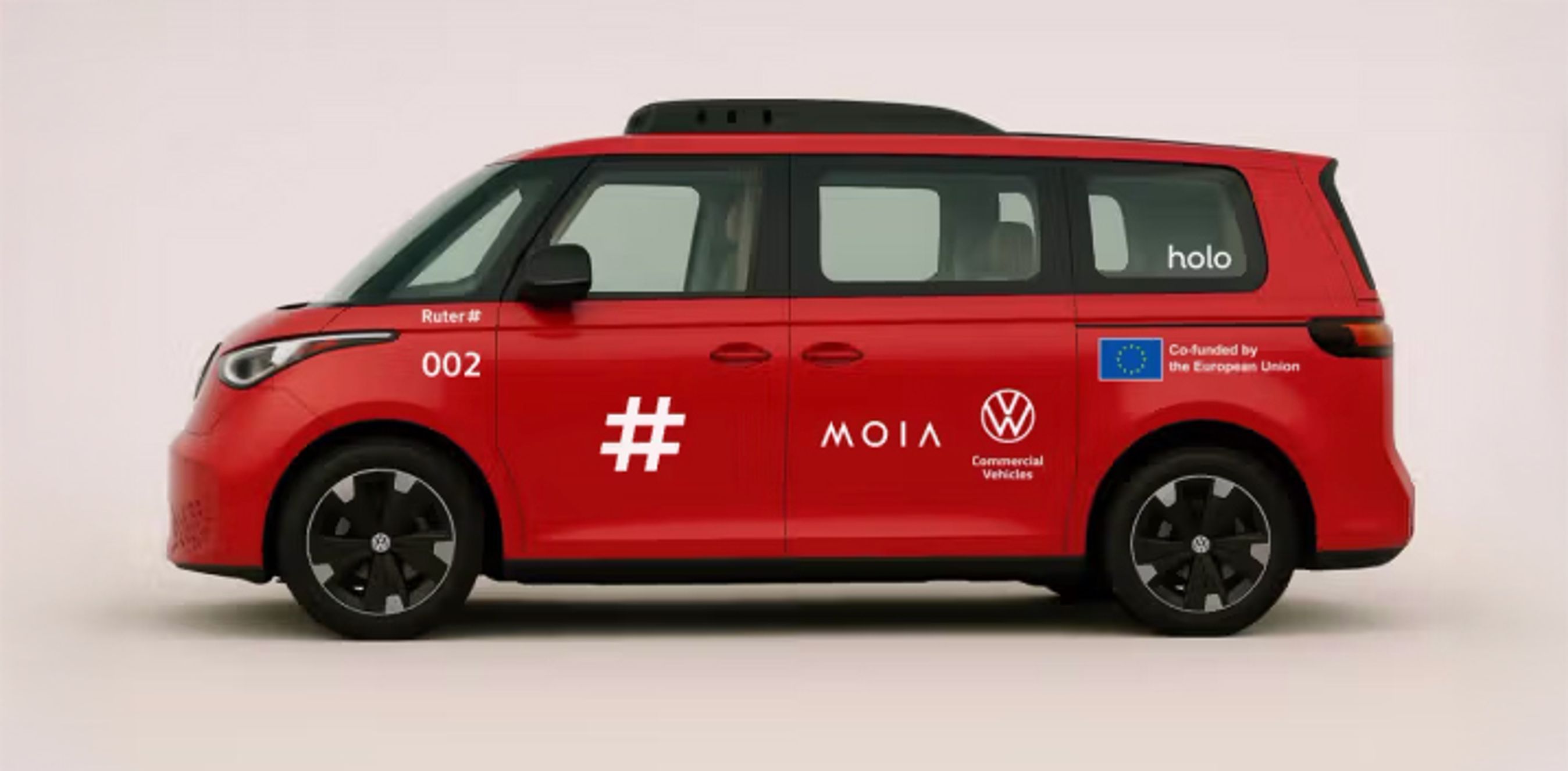 Rød VW ID. Buzz med teknikboks på taget.