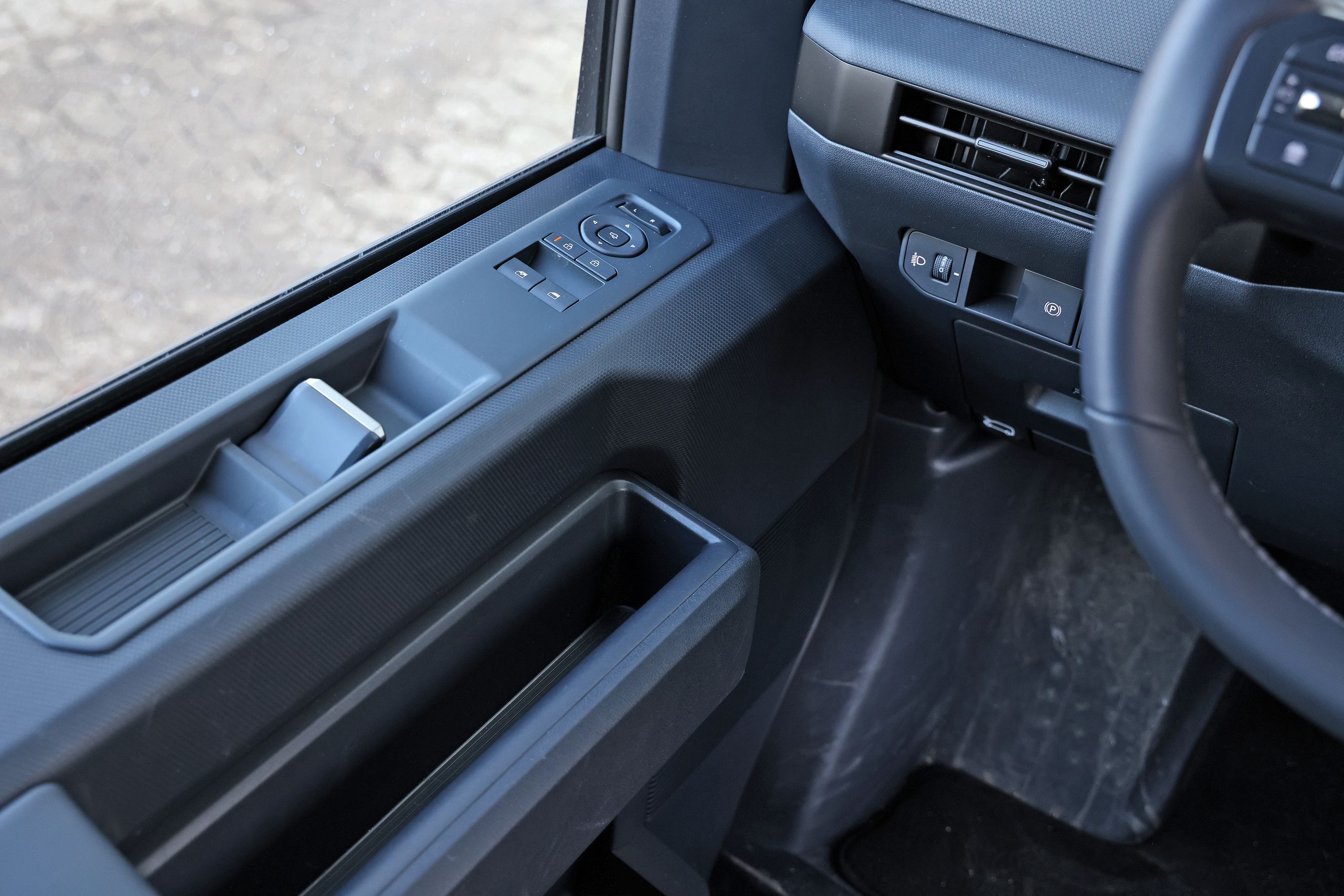 Knapper til rudehejs i en Kia PV5