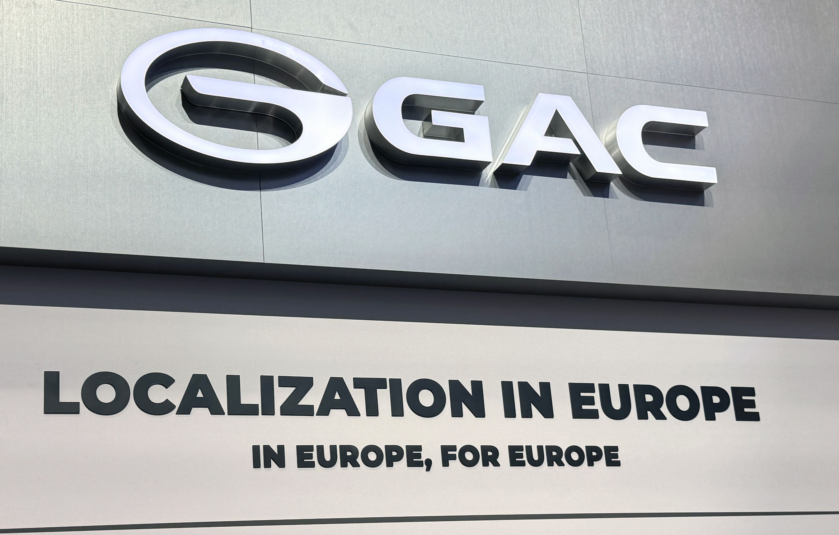 Reklameskilt for GAC.