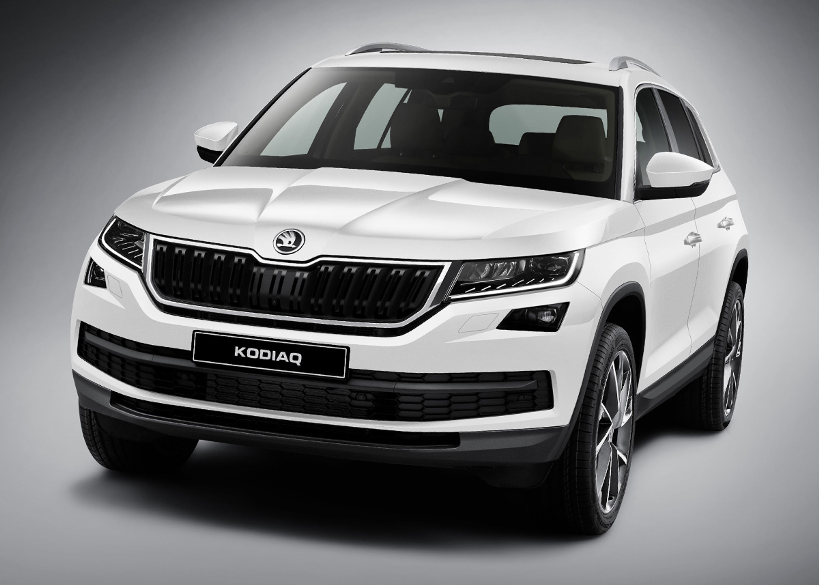 Skoda Kodiaq har en markant, nærmest tredimensionel grill, der går i ét med lygterne. Fotos: Skoda