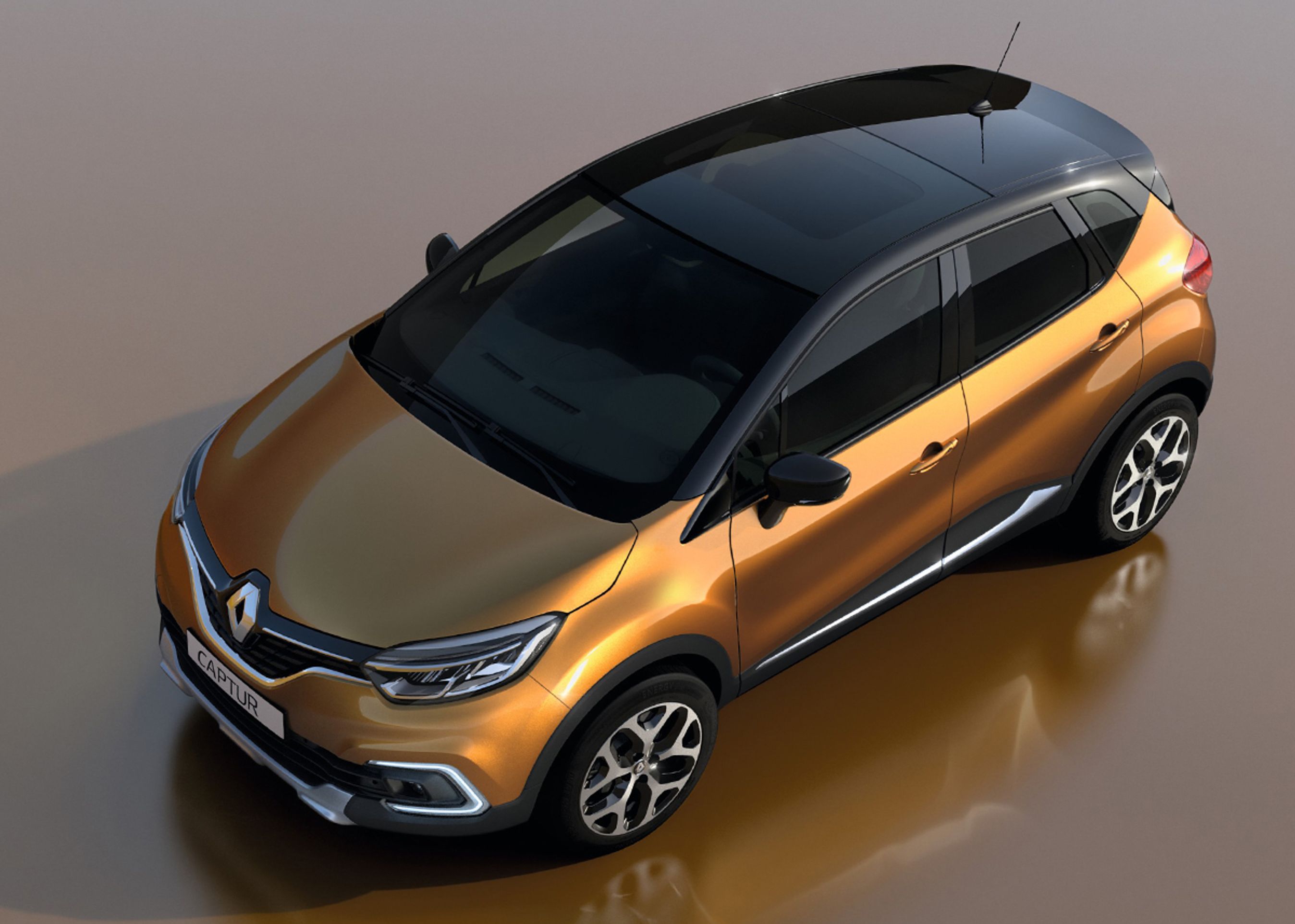 Et fast glastag kan fås til den fornyede Captur i kombination med tofarvet lakering.