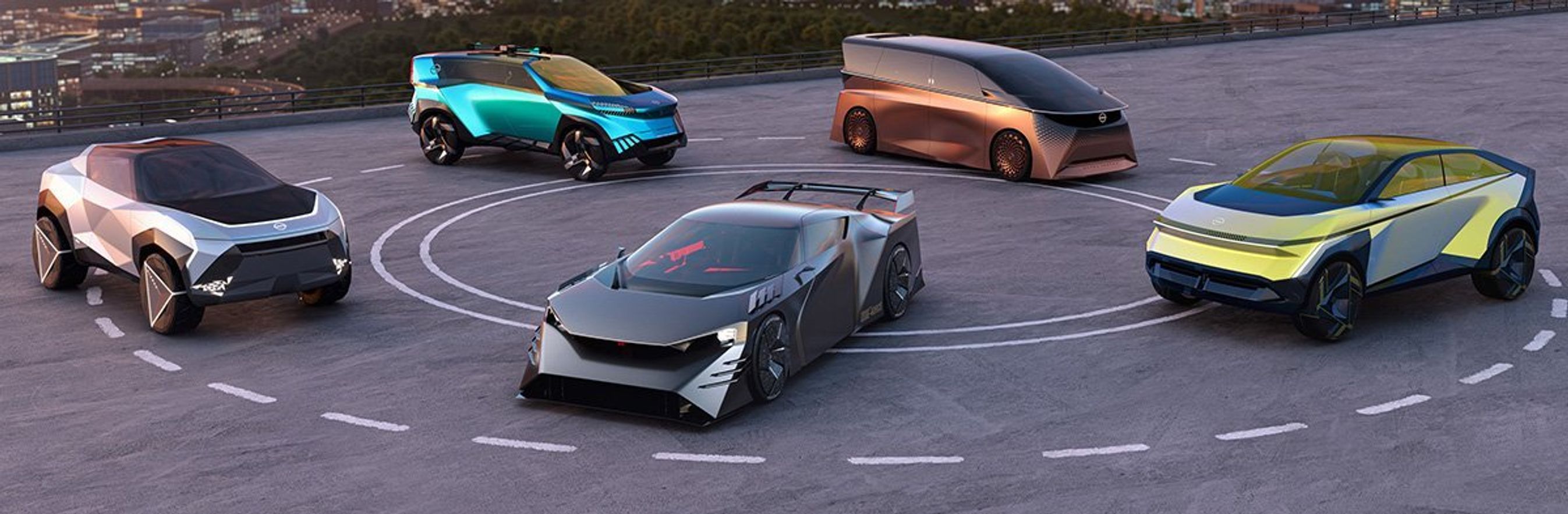 Fem konceptbiler på asfalt.