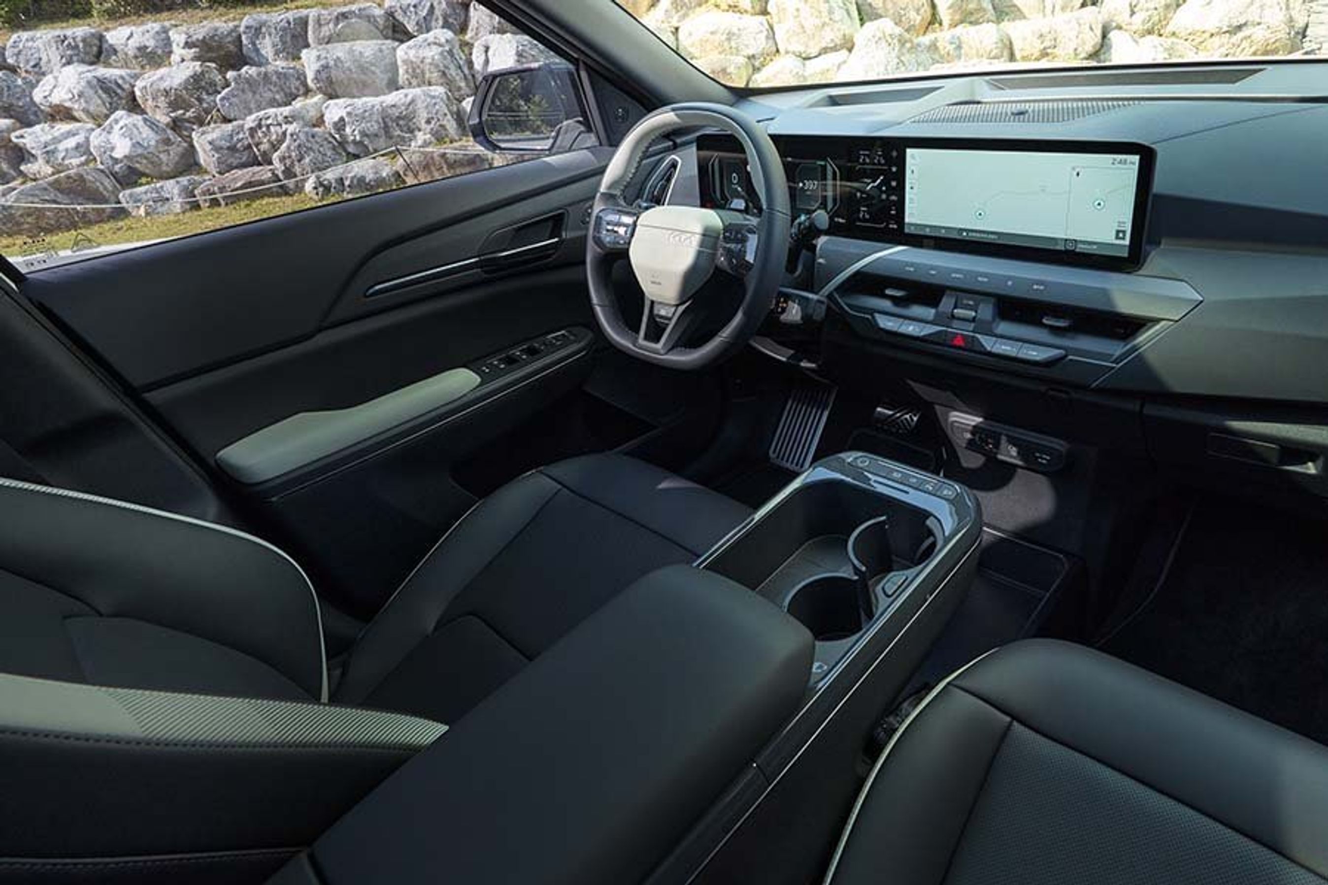 Førerpladsen i en Kia EV5